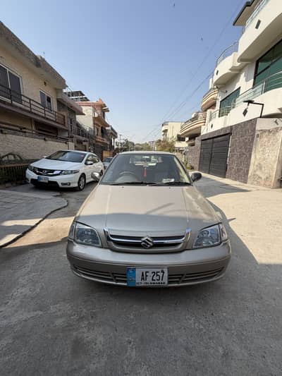 Suzuki Cultus Euro 2 Model 2013 islamabad registered golden colour.