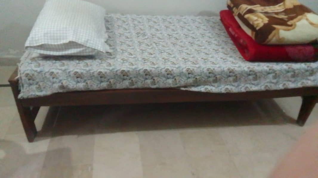 2 single beds and 1 study table 0