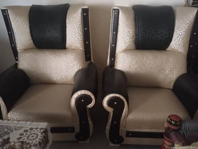 cream and black very soft and comfy sofa set