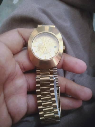 rado gold watch
