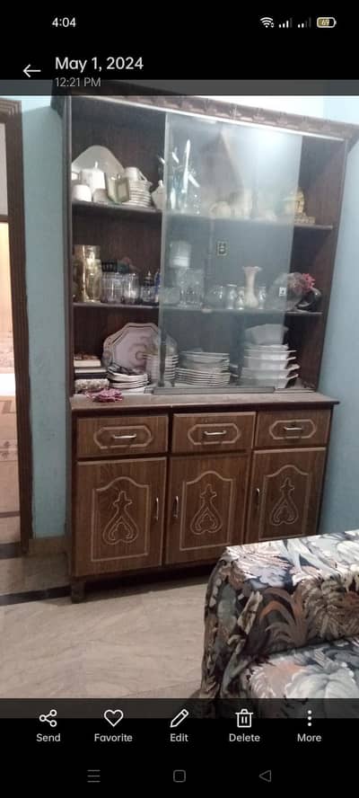 sofa and wooden showcase