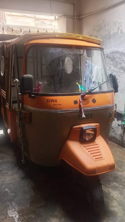 auto rickshaw  Siwa. all documents clear on thi spot biometric