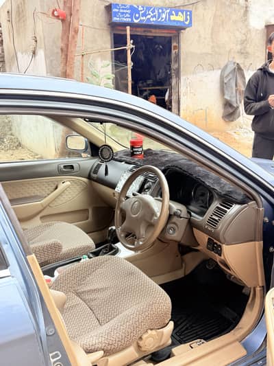 Honda civic 2004 model blue cloure Lahore number