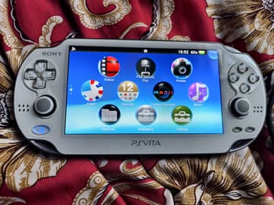 PS vita Jailbreak white color with 64GB Memory. Card games installed