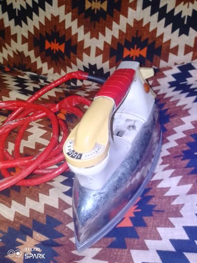 Iron for pressing clothes.