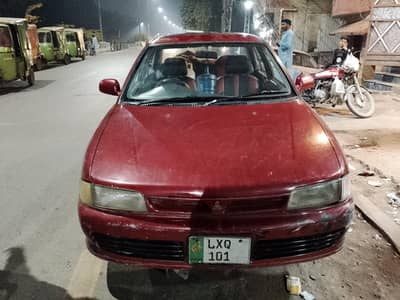 MITSUBISHI LANCER 1993 MODEL DESIL ENGING . GOOD FULE AVRAGE AND SMOTH