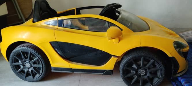 It's a toy battery car without battery and is functional . . . it's batt