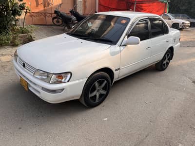 Indus Corolla 2001 own engine LPG/Petrol AC chilled