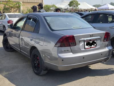 Honda Civix EXI 2004 Cat Eye