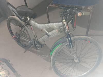 Gear bicycle with comfortable seat. in silver color  with disc break