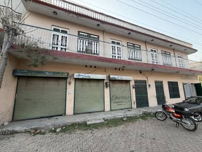 House With Three Shops Prime Commercial Location