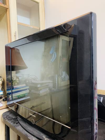 Samsung TV with Trolley . Contact me on whats app 03465852400