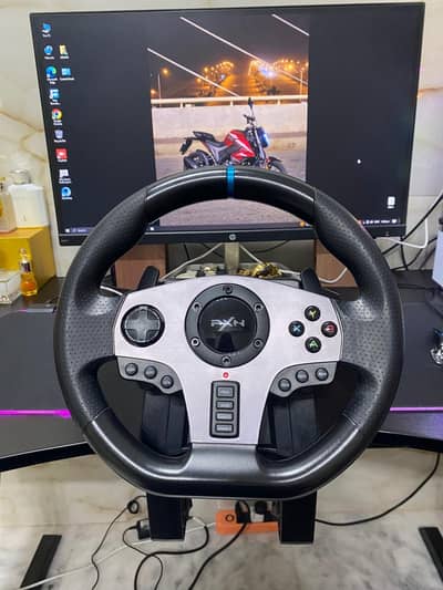 gaming steering wheel  pxn  v9 just like brand new.