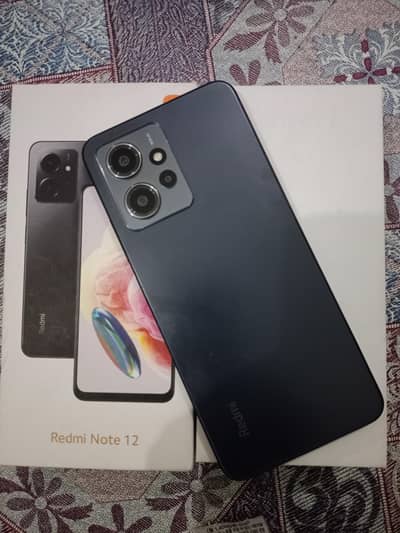 Redmi note 12.8/128 with box and 33w charger genuine