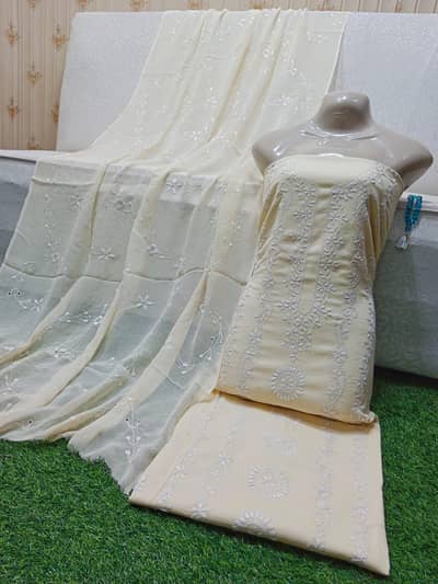 hand embroiderd lawn suits