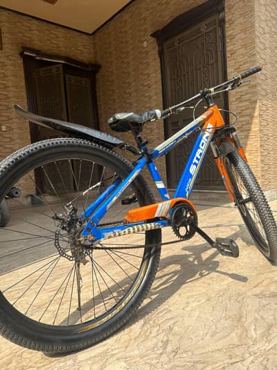 Orange mountain bike light weight fast cycle for sale