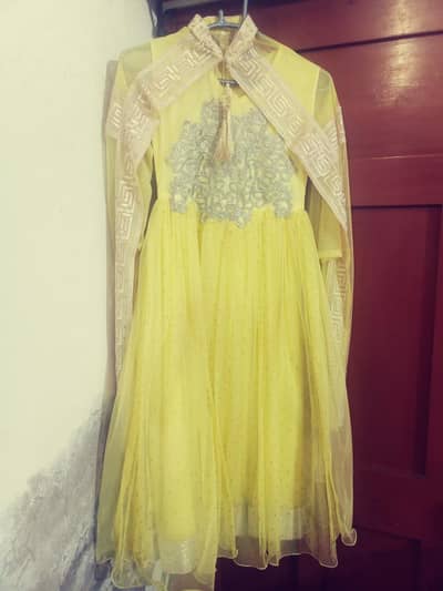 Elegant Yellow Net Party Wear Dress with Heavy Embroidery