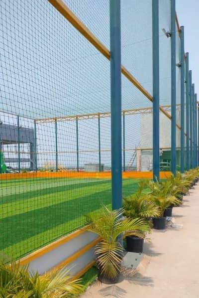 cricket net/grass /pole