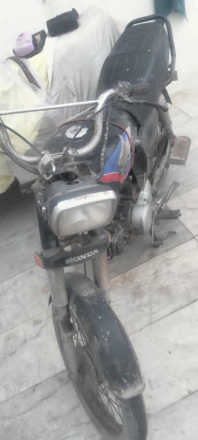 35,000 Honda 70  Pehla add pura phara exchange possible