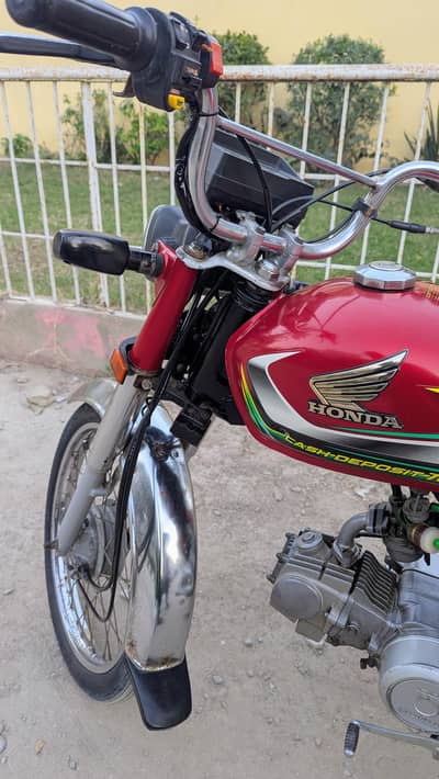 Honda cd 70 2022 red Karachi number