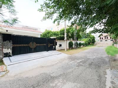 Facing Park 2 Kanal House In Stunning Wapda Town Phase 1 - Block H1 Is Available For Sale