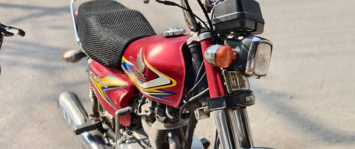 Honda 125 red  one hand use first onr