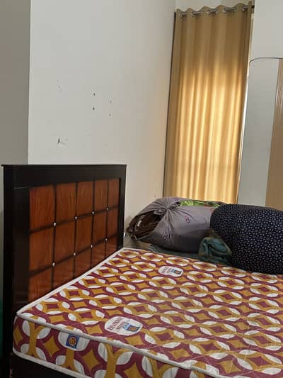 Single Wooden Bed with Mattress – Good Condition