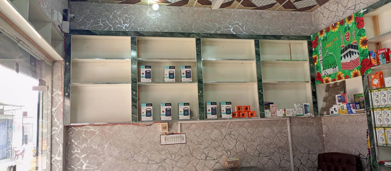 چلتا پھرتا کاروبار اور مکمل سامان فارسیل کاؤنٹر ،الماری،فرنٹ شیشہ 6