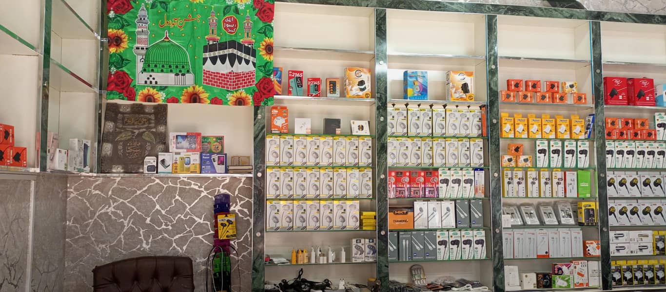 چلتا پھرتا کاروبار اور مکمل سامان فارسیل کاؤنٹر ،الماری،فرنٹ شیشہ 8