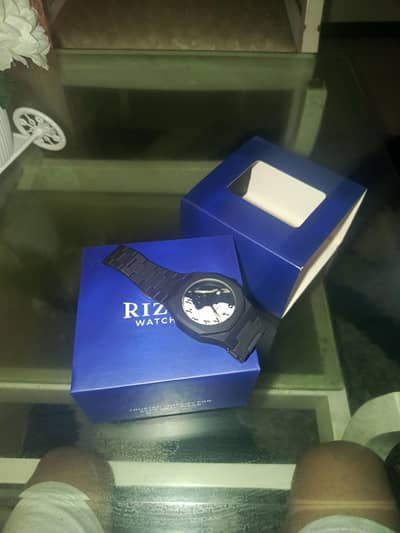 Rizen watch or quality is very nice  and only Rs 4500 aura quartz