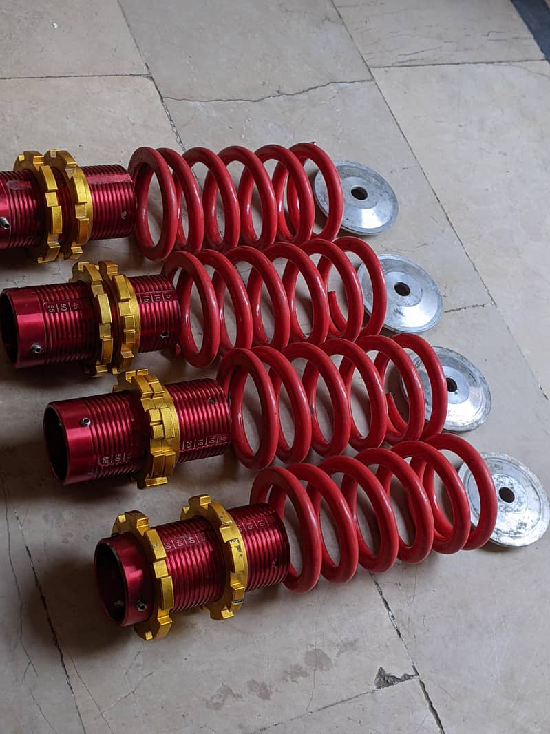 Adjustable coil over conversion kit. 1