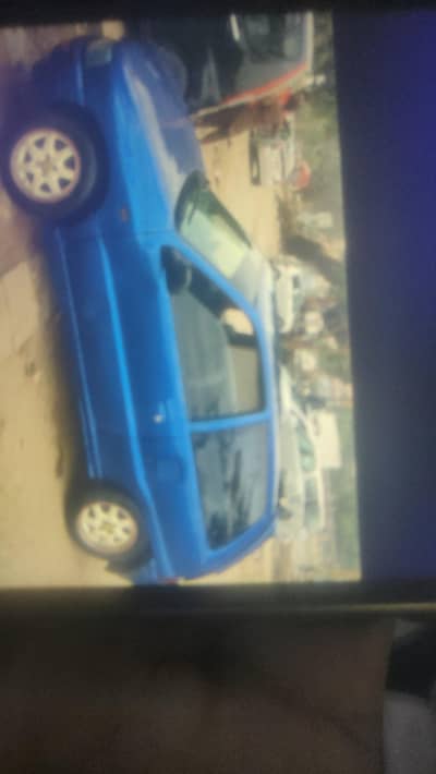 SPORTS CHARADE 2 DOOR . AUTOMATIC VITZ ENGINE