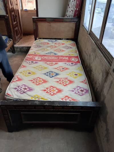 wooden single bed