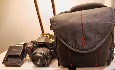 Nikon D5200 24.1 MP CMOS Digital SLR with 18-55mm