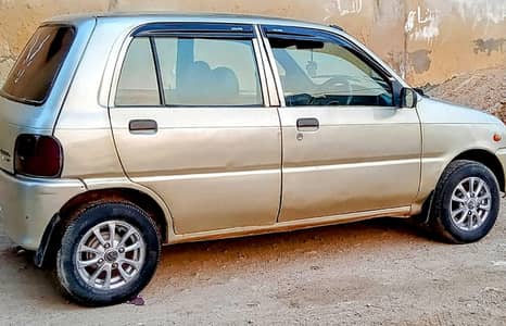 My Daihatsu coure home used car. 031428/9115/7