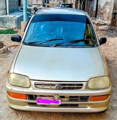 My Daihatsu coure home used car. 031428/9115/7