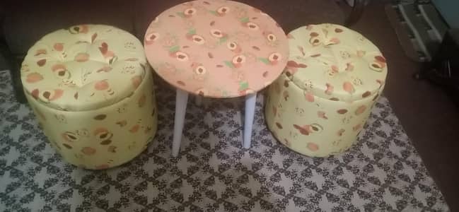 Two Outoman Seat with One Round table