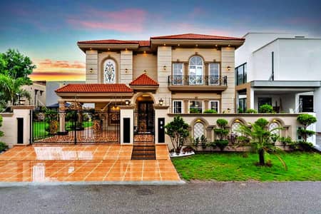 FAISAL RASOOL DESIGNER 2 KANAL (1-KANAL LAWN+1KANAL CONSTRUCTED) FULLY MAINTAINED SUPER HOT LOCATED BUNGALOW WITH FULL BASEMENT AND HOME THEATRE IS AVAILABLE IN THE BEST BLOCK OF PHASE 6 DHA LAHORE