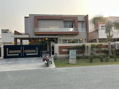 20 MARLA ELEGANT AND FULLY MAINTAINED SUPER HOT LOCATED BUNGALOW IS AVAILABLE IN THE BEST BLOCK OF DHA LAHORE.