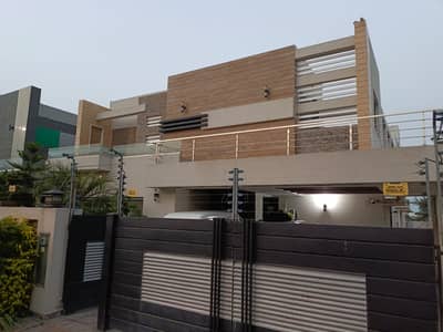 FULLY FURNISHED MODERN 1 KANAL FULLY MAINTAINED SUPER HOT LOCATED BUNGALOW WITH SOLAR SYSTEM INSTALLED IS AVAILABLE IN THE BEST BLOCK OF DHA LAHORE.