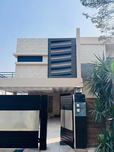 TOP LOCATION 1 KANAL BEAUTIFULL DESIGN SUPER HOT LOCATED BUNGALOW IS AVAILABLE IN THE H BLOCK OF DHA PHASE 6 LAHORE.