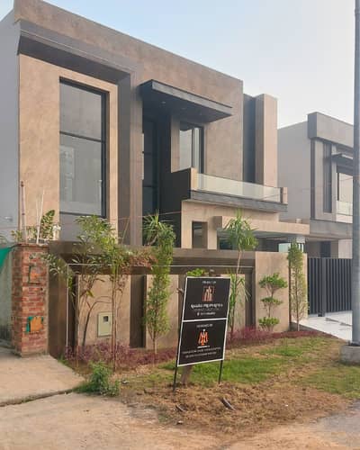 BRAND NEW 1 KANAL MODERN DESIGN SUPER HOT LOCATED BUNGALOW IS AVAILABLE IN THE U BLOCK OF DHA PHASE 7 LAHORE.