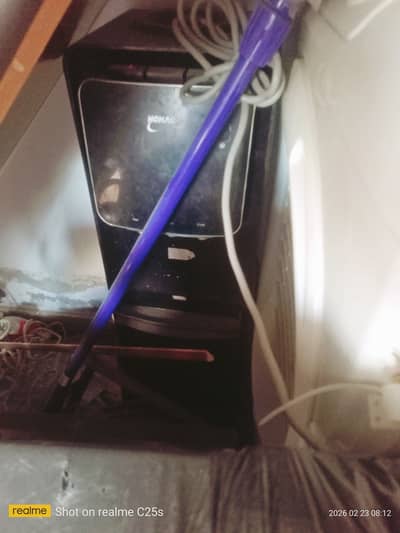 Homage water despensor. Placed in store but works perfectly.