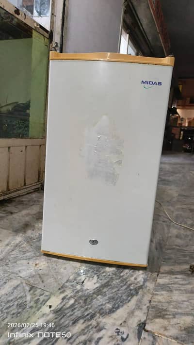 Room size frige For sale  company name Midas