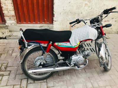 honda cd 70 red 12000kms everything original used shiny bike 100%