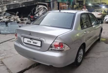 LANCER CAR FOR SALE WITH INSURED 10/10 CONDITION LIKE NEW  VERY GOOD .