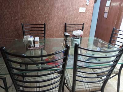 Glass Dining Table with 6 Iron Chairs – Good Condition