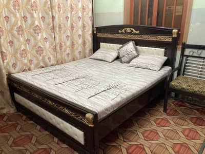 wooden heavy bed