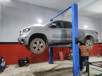 Car two post lift clear floor Real picture attached .