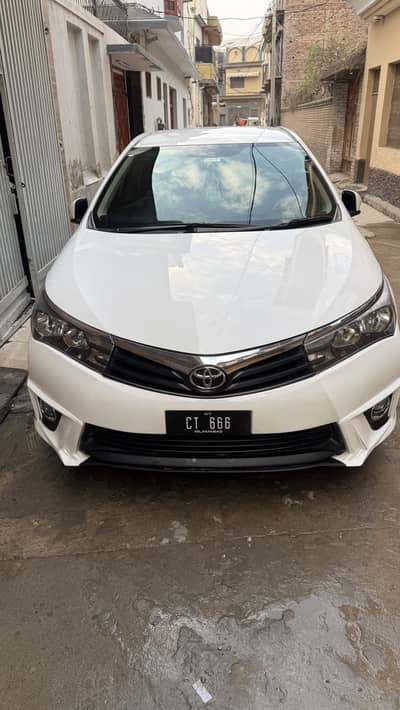 Toyota Altis super white 2016 own my name islamabad registered